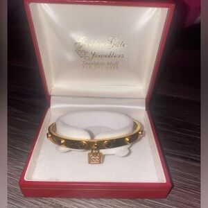 Golden bracelet w lock charm